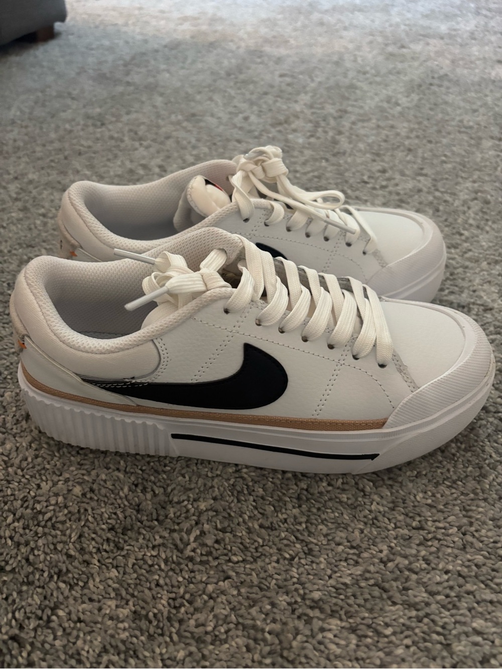 Nike White Sneakers with Black Swoosh and Tan Trim - Picture 2 of 4